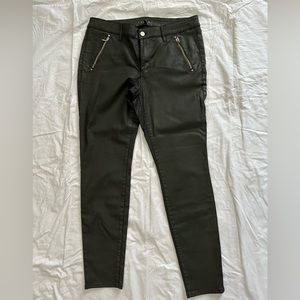 White House Black Market. Coated jeans/faux leather. dark green. Size 12.